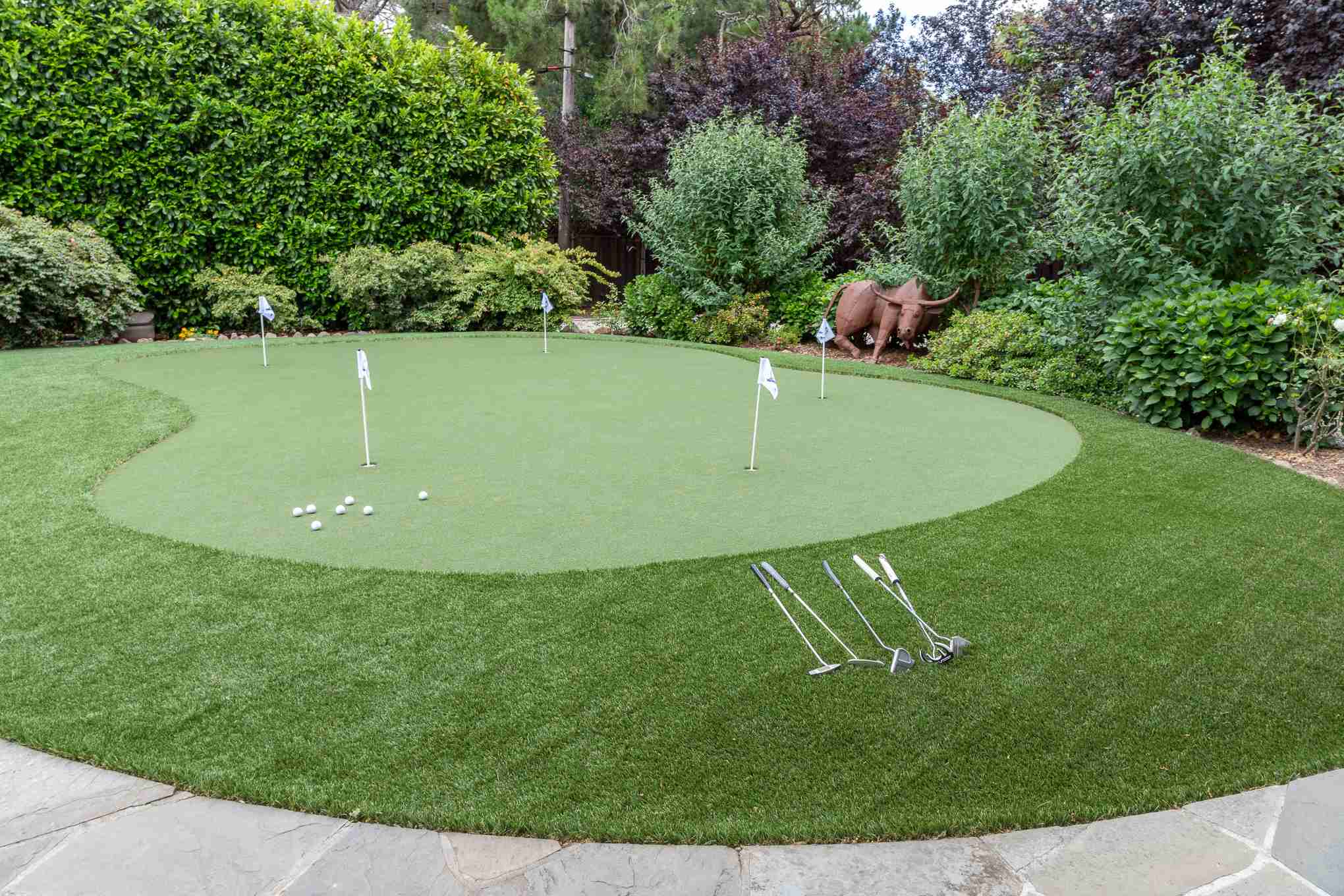 Custom backyard putting green with artificial turf Jacksonville FL
