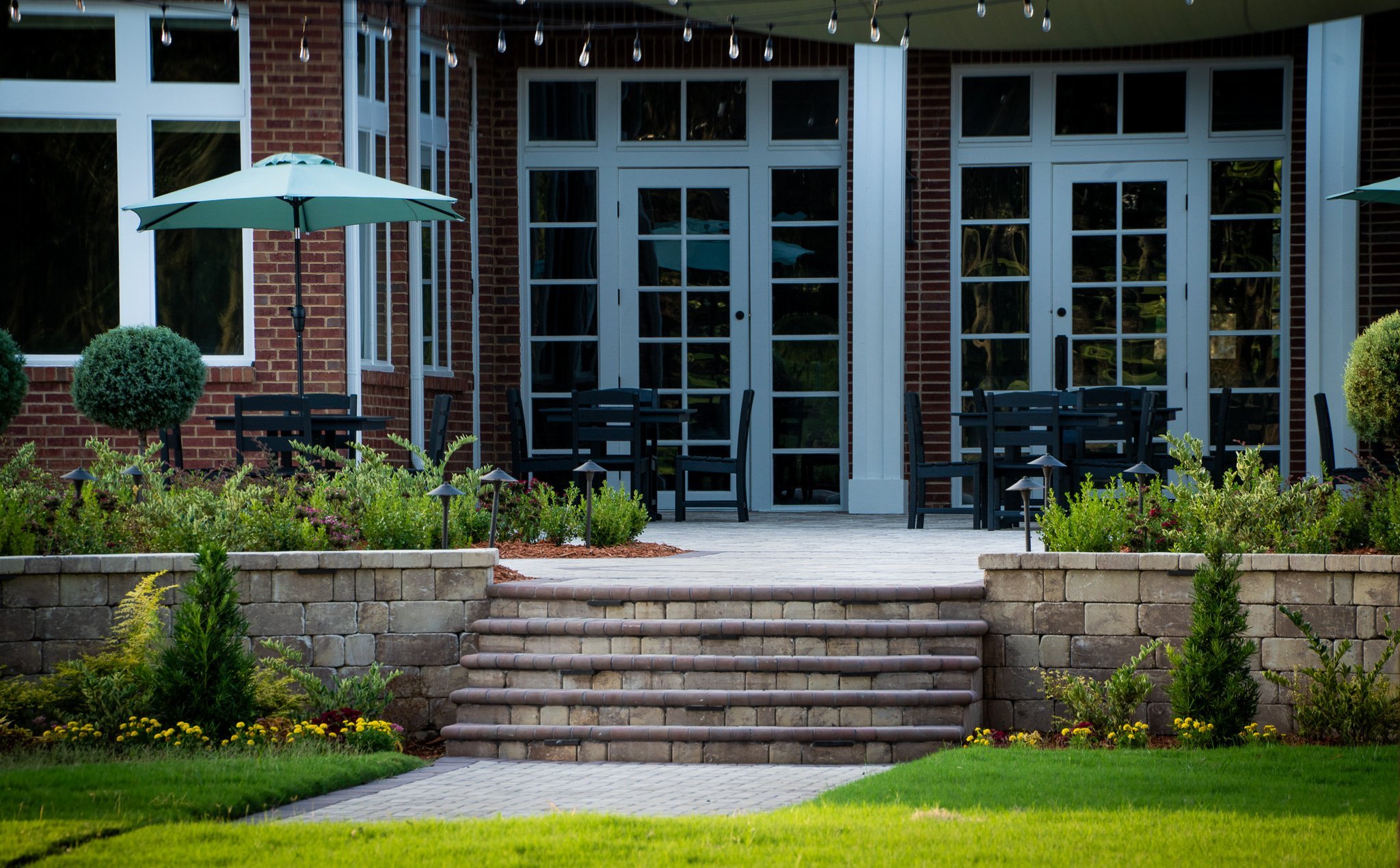 Paver walkway connecting outdoor spaces Jacksonville